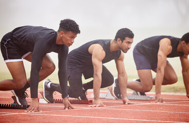 Men, race and running start in outdoor stadium for marathon, challenge and training for sport. Competition, track and workout of group with cardio in arena with runner, exercise and sprint line