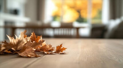 Autumn leaves scattered on a wooden table showcase the beauty of fall. Warm colors and cozy atmosphere create a serene setting.