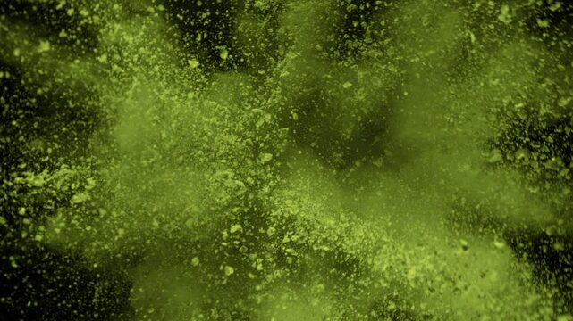 Super Slow Motion Shot of Matcha or Spirulina Powder Exploded Towards Camera at 1000fps.