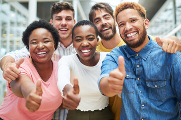 People, team and portrait at startup with thumbs up, smile and solidarity with hug for diversity in...