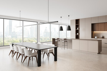 Beige home kitchen interior with dining table, bar island, cabinet near window