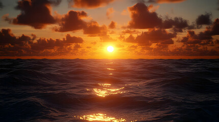Obraz premium Dramatic sunset over a vast ocean, with the sun setting in the distance behind a layer of clouds.
