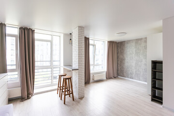 Clean kitchen in a small cozy contemporary studio apartment.