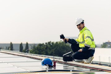 Inspector examination of photovoltaic modules using a thermal imaging camera. Engineer Checking...