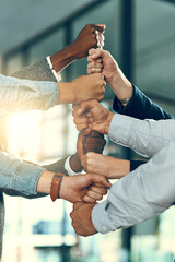 Business people, hands and fist stack with group for employee solidarity, inclusion and equality in...