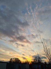 Serene Sunset Sky with Cirrus Clouds: A Perfect Background or Wallpaper
