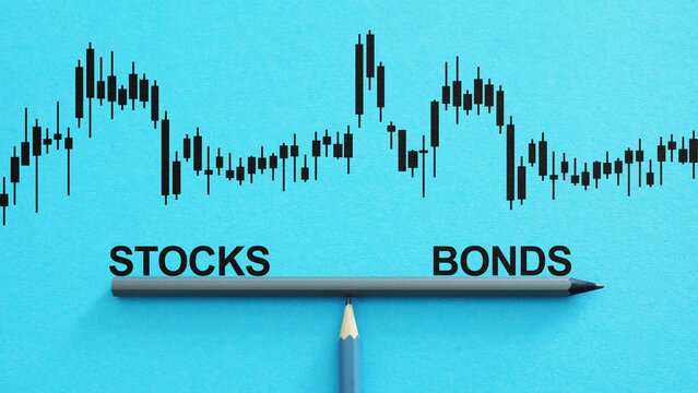 Stocks and bonds balancing on a scale as business and financial concept. Assets, investment and evaluation of risks