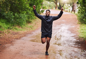 Celebrate, sports and man in nature for running, marathon training and exercise goals outdoors....