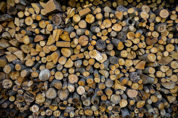 Chopped firewood close-up, wallpaper of firewood, lots of firewood, pile of firewood