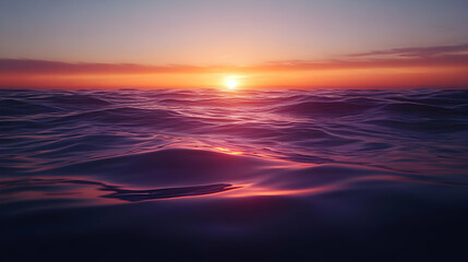 Sunset reflecting on the calm ocean surface.