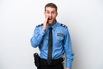 Young police caucasian man isolated on white background with surprise and shocked facial expression