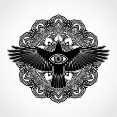 Fototapeta premium crow on ornamental mandala with eye symbol