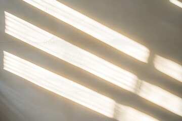 Obraz premium Sunlight casting stripes on a wall, soft shadows