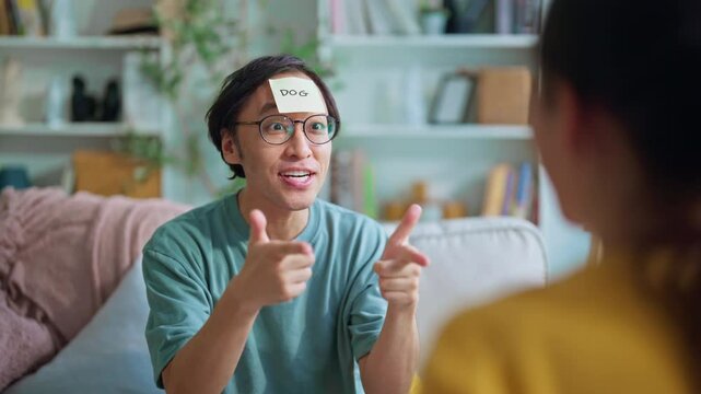 happiness fun and cheerful moment husband and wife playing paper quiz fun game together at home funny hobby sunday morning game positive good vibes positive relation concept at home lifestyle