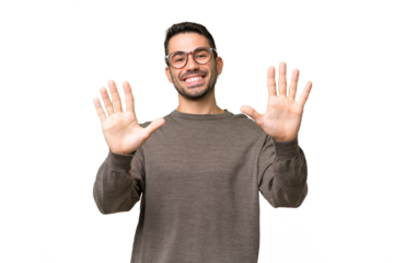 Young handsome caucasian man over isolated background counting ten with fingers