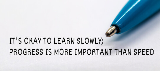 It okay to learn slowly, progress is more important than speed text with close up blue pen...