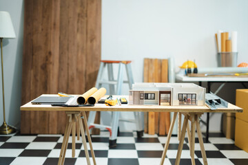 Construction house and building. workspace area. dof laptop computer and office construction on...