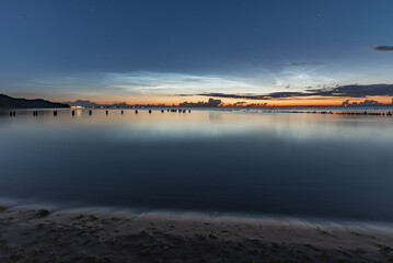 Summer sunrise with noctilucent clouds