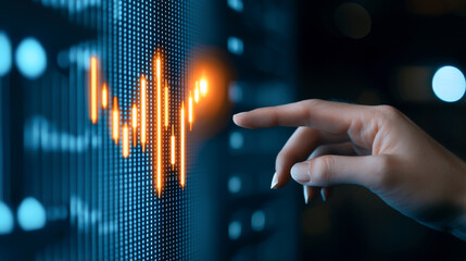 A hand interacting with a digital display showing a vibrant analytics graph, depicting data trends and data visualization.