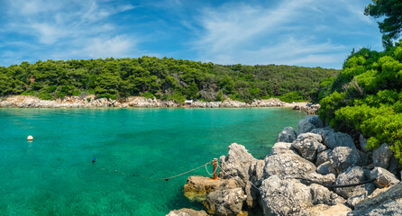 Panorama of the stunning Adriatic coast with turquoise sea water on the Rab island, Dalmatia...
