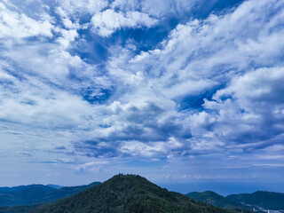 Fototapeta premium Drone view Beautiful clouds blue sky over sea in high season at Phuket Thailand