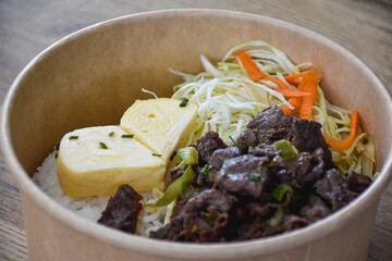Korean food with beef and egg heart and rice