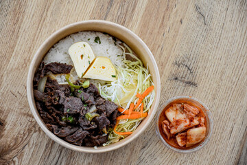 Korean food with beef and egg heart and rice
