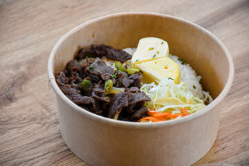 Korean food with beef and egg heart and rice