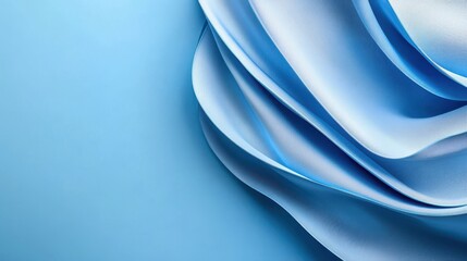 Fototapeta premium A soft, flowing blue fabric creates a serene and elegant backdrop, perfect for various design and artistic projects.