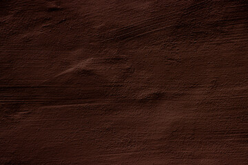 Brown colored abstract wall background with textures of different shades of brown