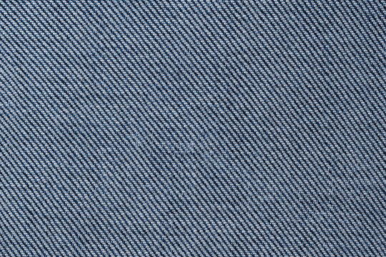 Marco photography of denim fabric texture background textile meterial wallpaper white and blue color