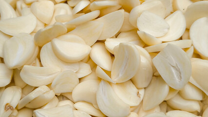 Sliced ​​garlic for background. Indian food.