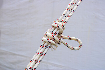Types of rope tying. Hooks and ropes. Tying knots.