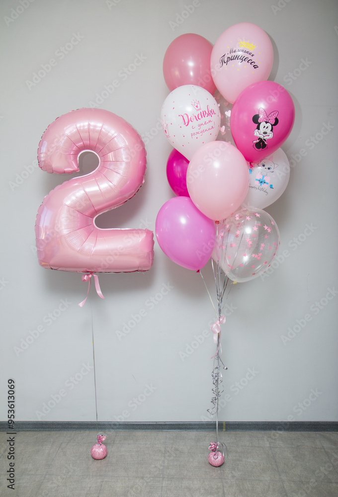 Wall mural pink number 2 and a bunch of pink helium balloons