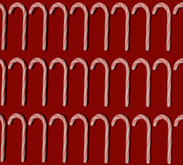 Seamless pattern with sugar cane candies on a red background. Christmas pattern. New Year. Fun