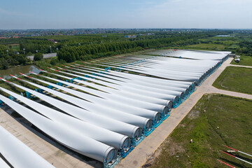 view of blades of wind power turbine in field