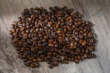 Roasted coffee beans on dark background