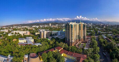 Naklejka premium View from a quadcopter of the central part of the Kazakh city of Almaty on a summer evening