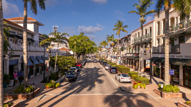 May 6, 2023 - Naples, Florida, USA - Iconic daytime 5th Avenue aerial with luxury shops and cars on 5th ave. 


