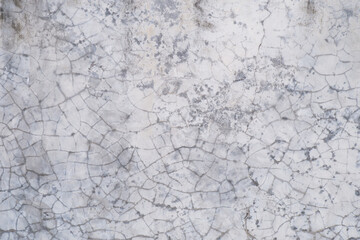 gray cracked stucco wall texture background