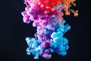 Fototapeta premium Ink drop creates colorful bubbles in dynamic flow. Vivid abstract design on black background.