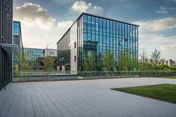 Contemporary Office Architecture with Glass Facade and Green Surroundings