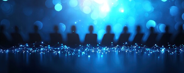 Silhouetted figures against a vibrant blue background, representing teamwork and collaboration in a digital environment.