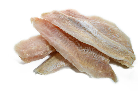 Pieces of fresh raw hake fish isolated on white background.