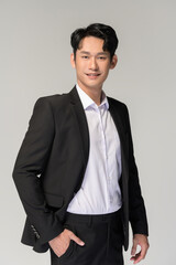 Portrait of Happy asian man wearing suit over white background
