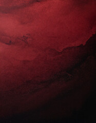 Dark red and black abstract background with grainy texture. Deep and rich tones. Paint smudges