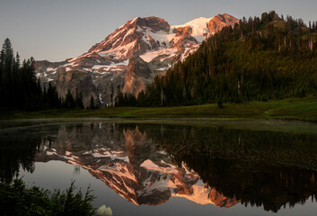 Pink Evening Light Hits Mount Rainier and Its Reflection in Aurora Lake