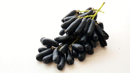 Moon drops grape,bunch of black grape on white background, fresh grapes fruit