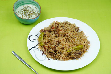 Beef pulao in white plate. Beef Yakhni Pulao. plate of rice