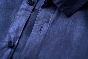 Close up of men's striped shirt. Soft focus.	